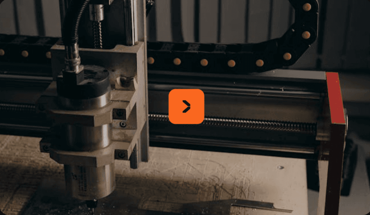 CNC machine on the shop floor — source video still